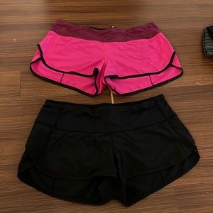 BLACK AND PINK TWO TONED LULU LEMON SHORTS